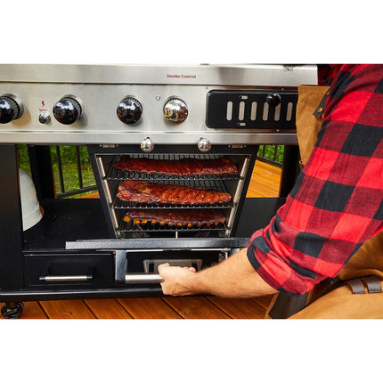 Barbecue gaz PITBOSS MEMPHIS 2.0, sur chariot , une zone de cuisson gaz, une charbon et un fumoir électrique 3 étages.