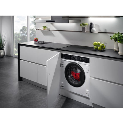 Lave linge séchant hublot encastrable AEG LWG88416BI